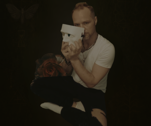 billy coull just billy dark background with symbols of month hour glass and other alchemy style logos